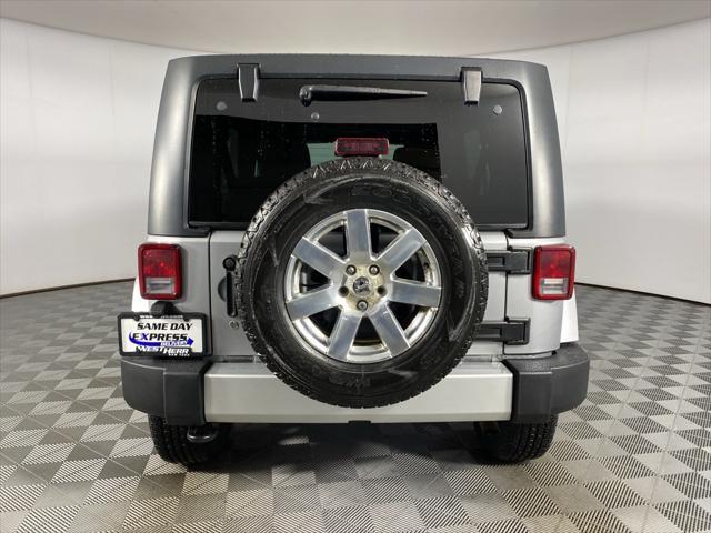 used 2015 Jeep Wrangler Unlimited car, priced at $23,564