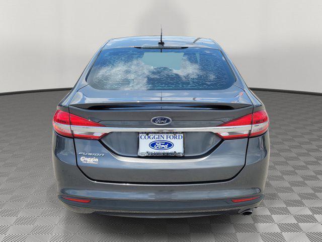 used 2018 Ford Fusion car, priced at $14,300