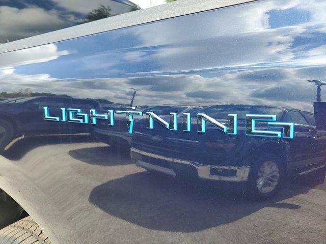 new 2025 Ford F-150 Lightning car, priced at $70,220