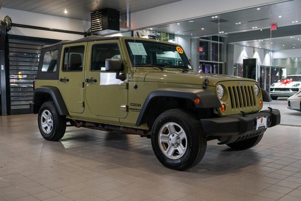 used 2013 Jeep Wrangler Unlimited car, priced at $15,549