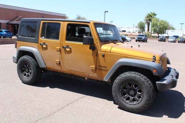 used 2014 Jeep Wrangler Unlimited car, priced at $16,555