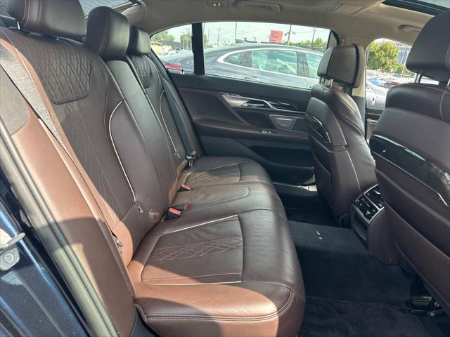 used 2016 BMW 750 car, priced at $19,995