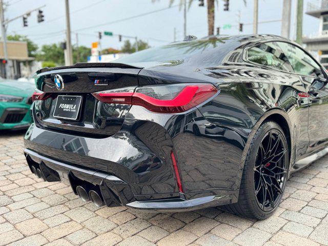 used 2024 BMW M4 car, priced at $82,800