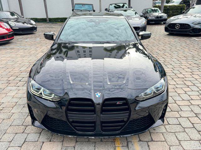 used 2024 BMW M4 car, priced at $82,800