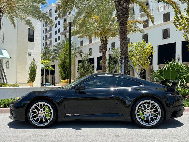 used 2023 Porsche 911 car, priced at $132,800