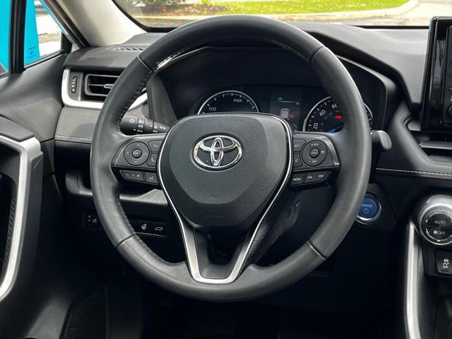 used 2021 Toyota RAV4 Hybrid car, priced at $29,990