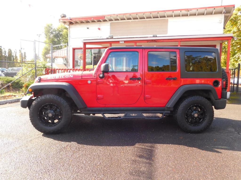 used 2012 Jeep Wrangler Unlimited car, priced at $15,995