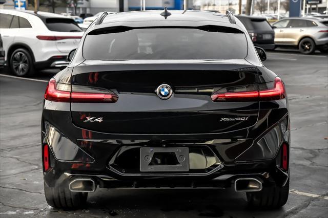 used 2022 BMW X4 car, priced at $39,566