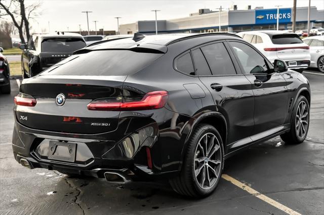 used 2022 BMW X4 car, priced at $39,566