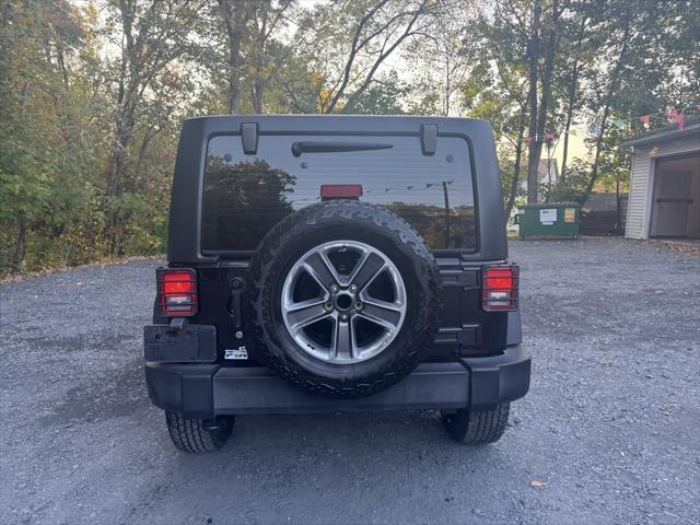 used 2018 Jeep Wrangler JK Unlimited car, priced at $18,993