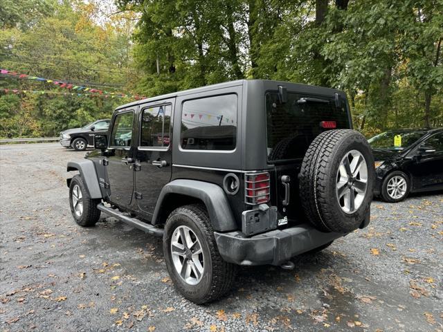 used 2018 Jeep Wrangler JK Unlimited car, priced at $20,988