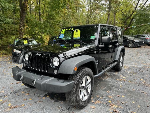 used 2018 Jeep Wrangler JK Unlimited car, priced at $20,988