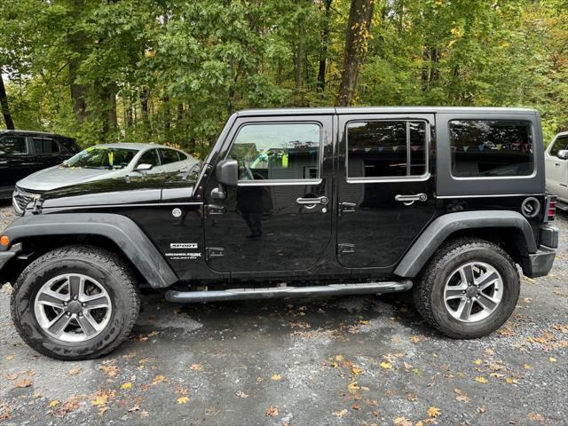 used 2018 Jeep Wrangler JK Unlimited car, priced at $20,988