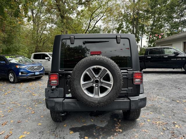 used 2018 Jeep Wrangler JK Unlimited car, priced at $20,988