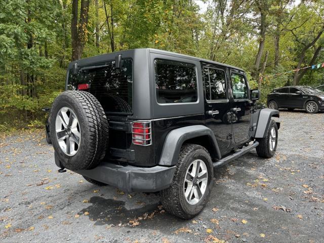 used 2018 Jeep Wrangler JK Unlimited car, priced at $20,988