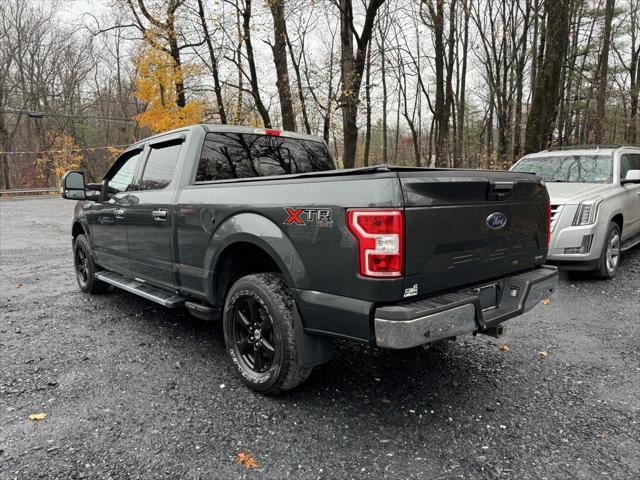 used 2018 Ford F-150 car, priced at $24,988