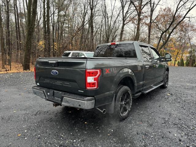 used 2018 Ford F-150 car, priced at $24,988