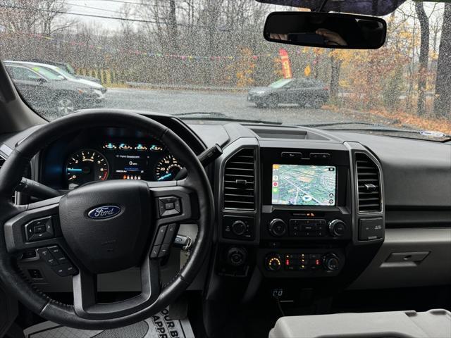 used 2018 Ford F-150 car, priced at $24,988