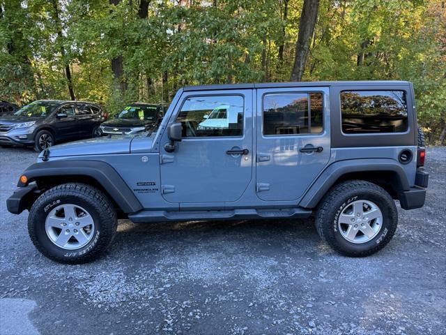 used 2014 Jeep Wrangler Unlimited car, priced at $16,988