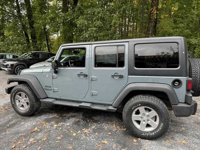 used 2014 Jeep Wrangler Unlimited car, priced at $19,988