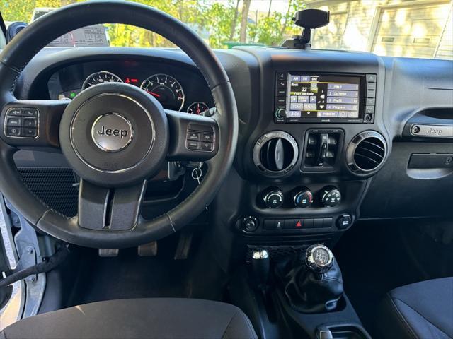 used 2014 Jeep Wrangler Unlimited car, priced at $16,988