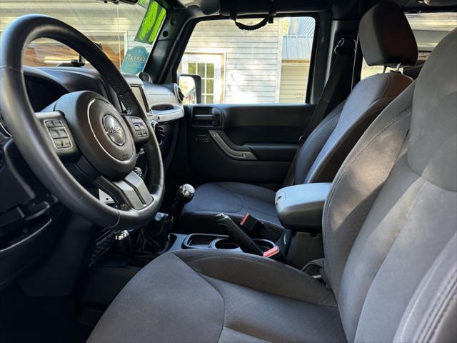 used 2014 Jeep Wrangler Unlimited car, priced at $16,988