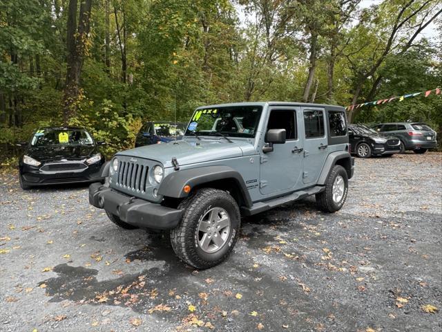 used 2014 Jeep Wrangler Unlimited car, priced at $19,988