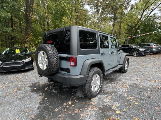 used 2014 Jeep Wrangler Unlimited car, priced at $19,988