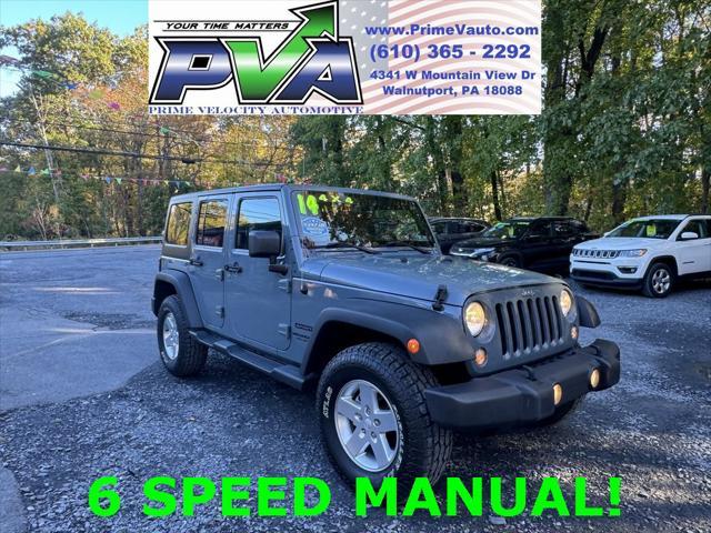 used 2014 Jeep Wrangler Unlimited car, priced at $16,988