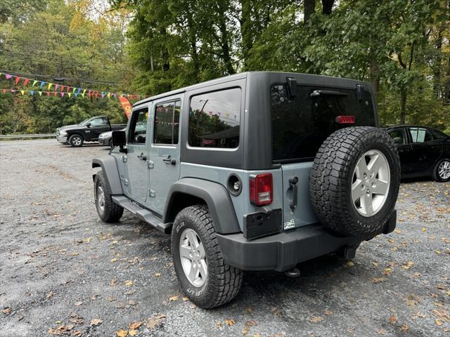 used 2014 Jeep Wrangler Unlimited car, priced at $19,988