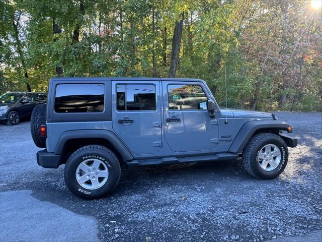 used 2014 Jeep Wrangler Unlimited car, priced at $16,988