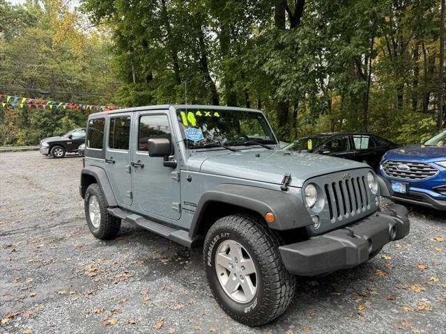 used 2014 Jeep Wrangler Unlimited car, priced at $19,988