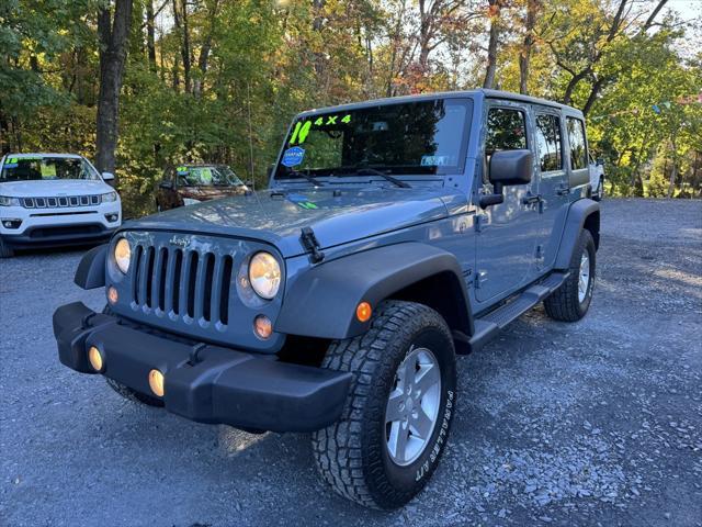 used 2014 Jeep Wrangler Unlimited car, priced at $16,988