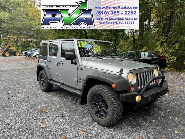 used 2013 Jeep Wrangler Unlimited car, priced at $16,988