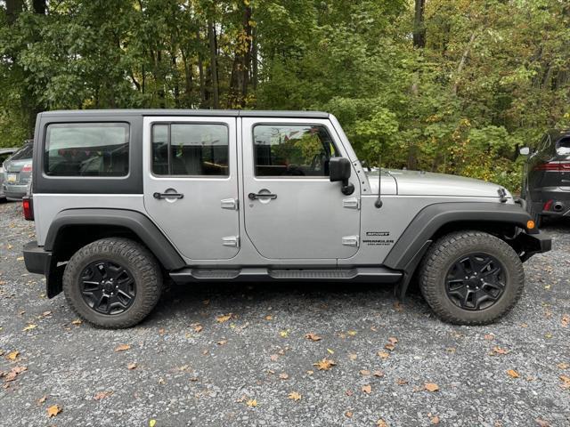 used 2013 Jeep Wrangler Unlimited car, priced at $16,988