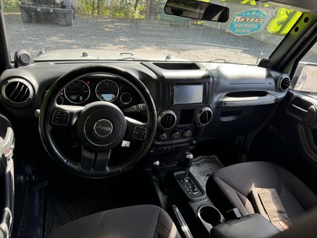 used 2013 Jeep Wrangler Unlimited car, priced at $16,988