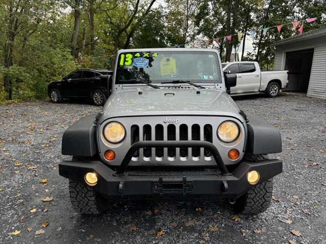 used 2013 Jeep Wrangler Unlimited car, priced at $16,988