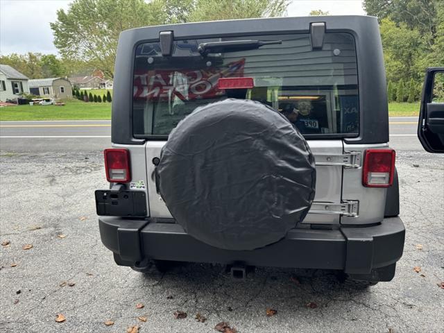 used 2013 Jeep Wrangler Unlimited car, priced at $16,988