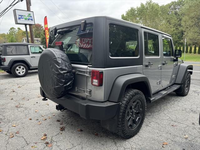 used 2013 Jeep Wrangler Unlimited car, priced at $16,988