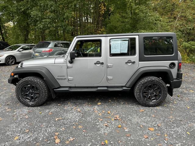 used 2013 Jeep Wrangler Unlimited car, priced at $16,988