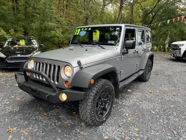 used 2013 Jeep Wrangler Unlimited car, priced at $16,988