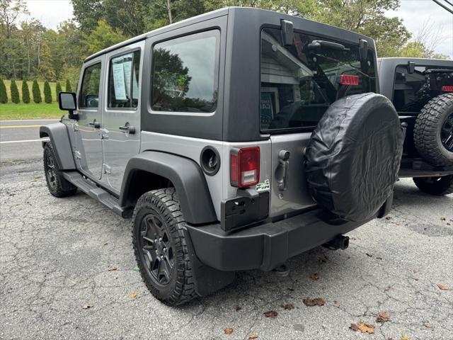 used 2013 Jeep Wrangler Unlimited car, priced at $16,988