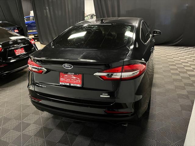 used 2020 Ford Fusion car, priced at $15,399
