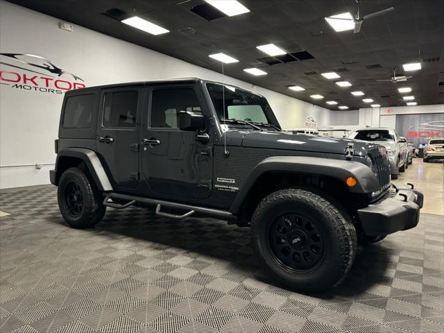 used 2018 Jeep Wrangler JK Unlimited car, priced at $24,599
