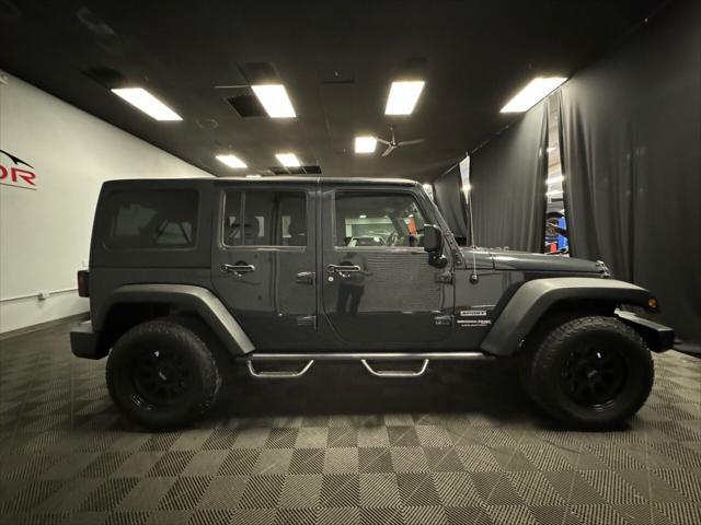 used 2018 Jeep Wrangler JK Unlimited car, priced at $24,599