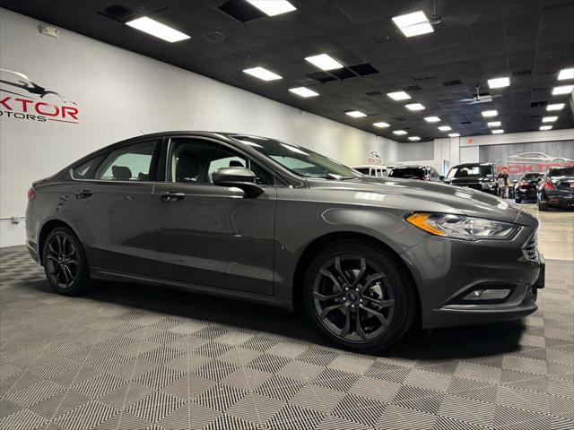 used 2018 Ford Fusion car, priced at $14,899