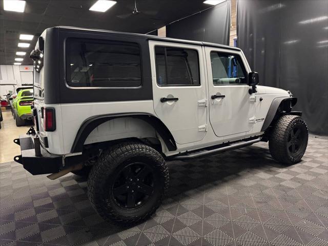 used 2018 Jeep Wrangler JK Unlimited car, priced at $23,398