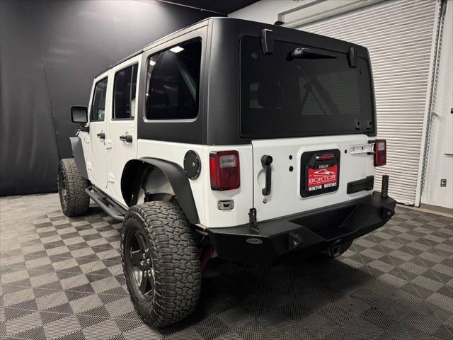 used 2018 Jeep Wrangler JK Unlimited car, priced at $23,398