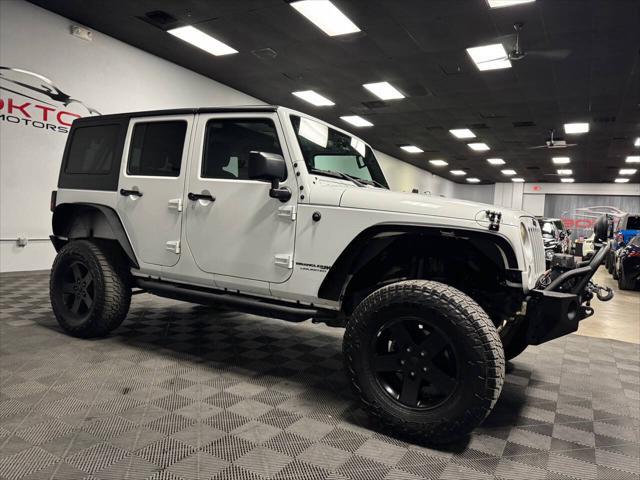 used 2018 Jeep Wrangler JK Unlimited car, priced at $23,398