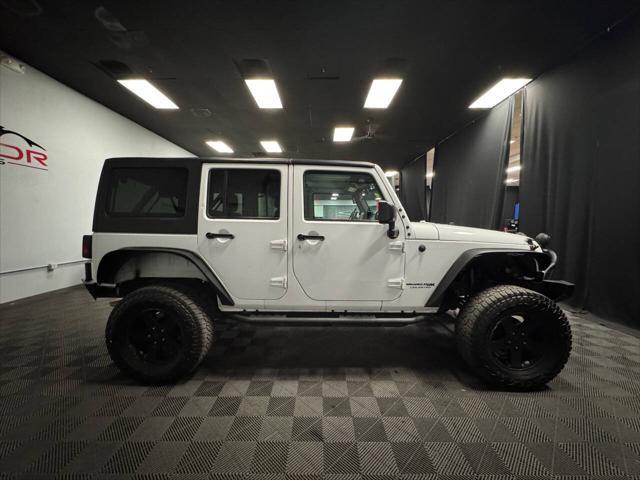 used 2018 Jeep Wrangler JK Unlimited car, priced at $23,398